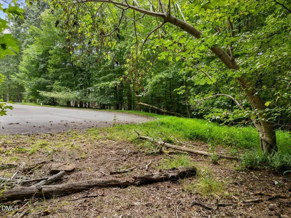 a view of a swimming pool with an outdoor space and seating area