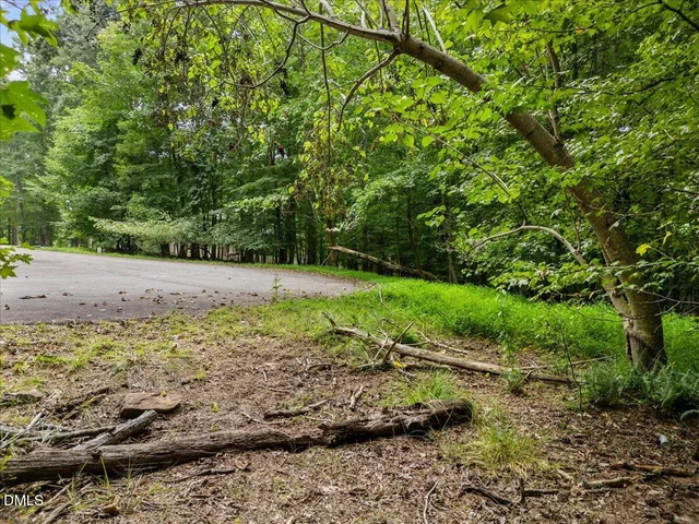 a view of a swimming pool with an outdoor space and seating area