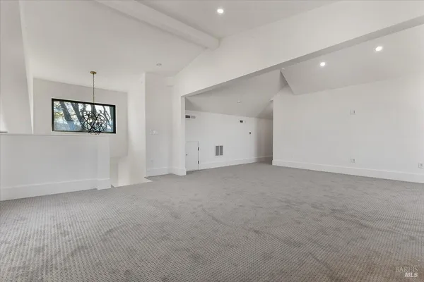 a view of a livingroom with furniture and wooden floor