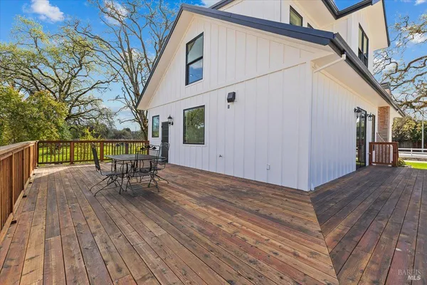 a front view of a house with a door and a yard