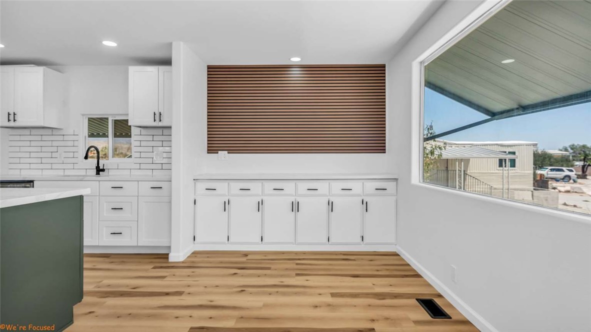 73250 Colonial Drive Thousand Palms, CA 92276 - Photo 8 of 18 a view of a kitchen with wooden cabinet