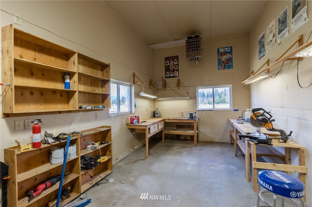 5434 Noon Road Bellingham, WA 98226 - Photo 13 of 40 a room with furniture a rug toys and a window