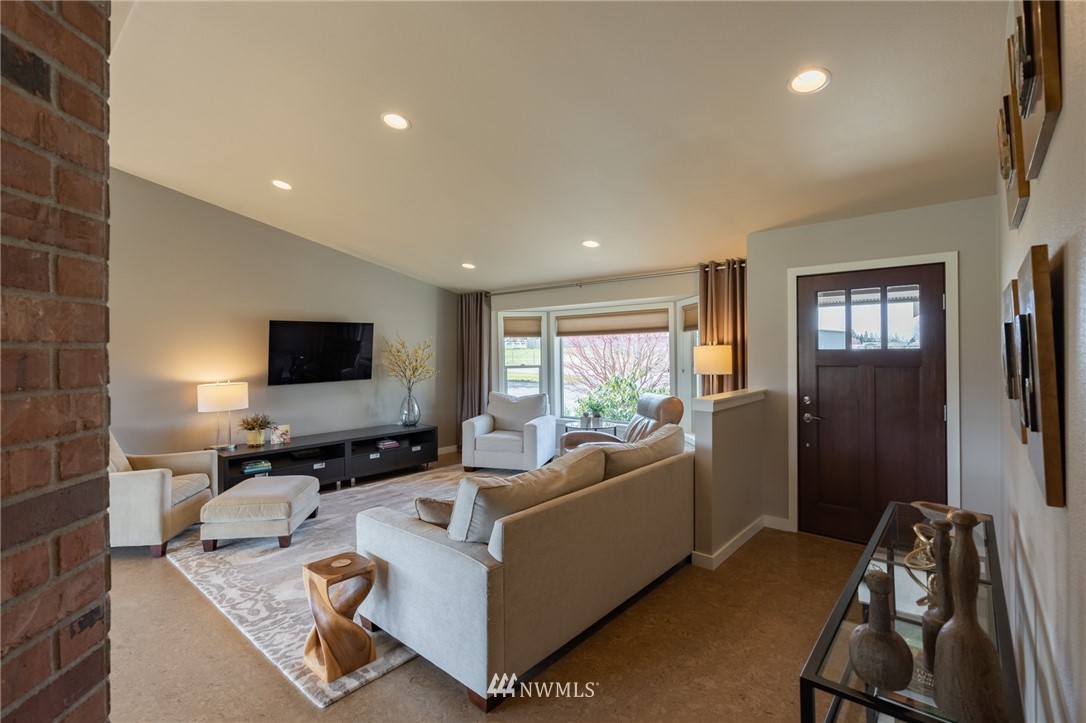 5434 Noon Road Bellingham, WA 98226 - Photo 16 of 40 a living room with furniture and a flat screen tv
