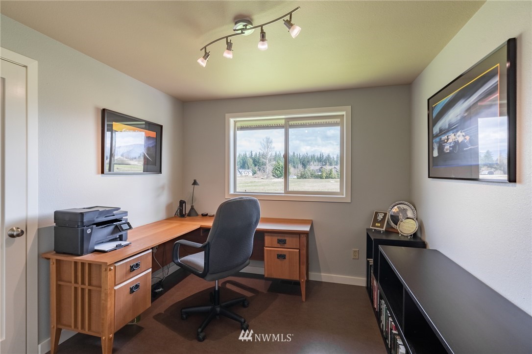 5434 Noon Road Bellingham, WA 98226 - Photo 19 of 40 a view of a workspace with furniture and a window
