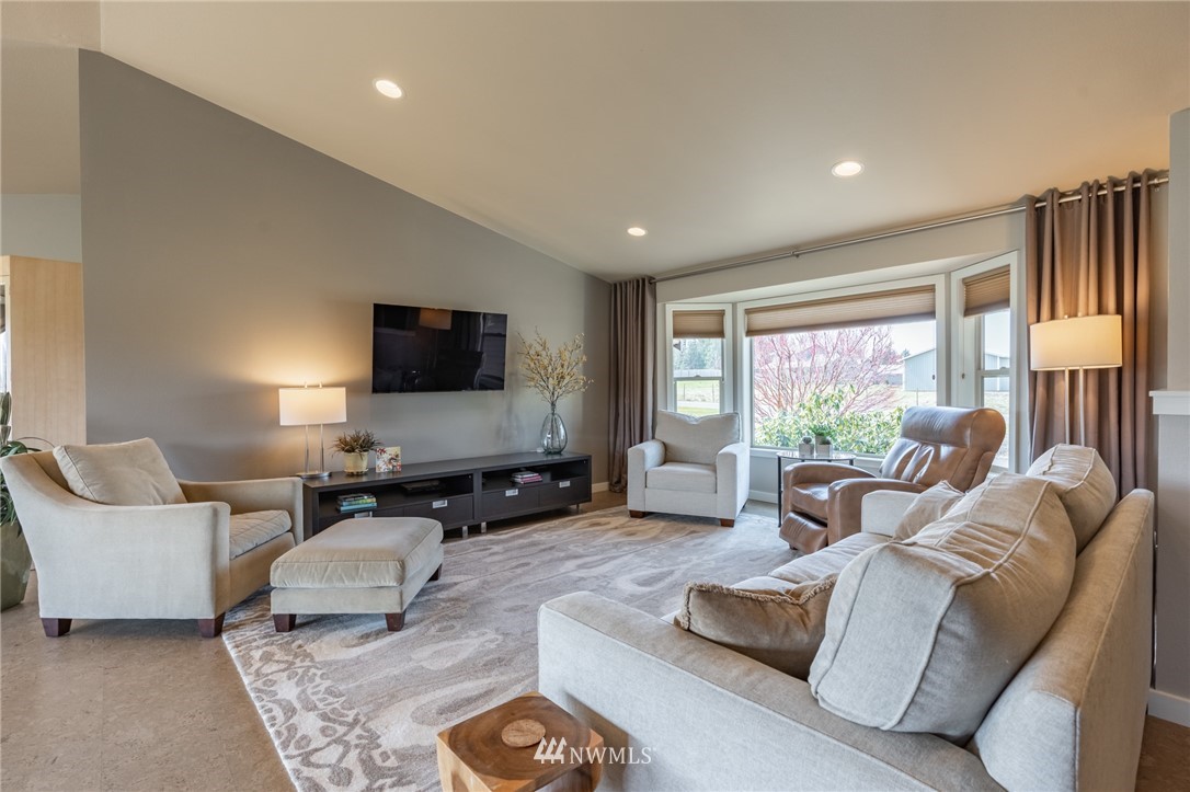 5434 Noon Road Bellingham, WA 98226 - Photo 30 of 40 a living room with furniture and a flat screen tv