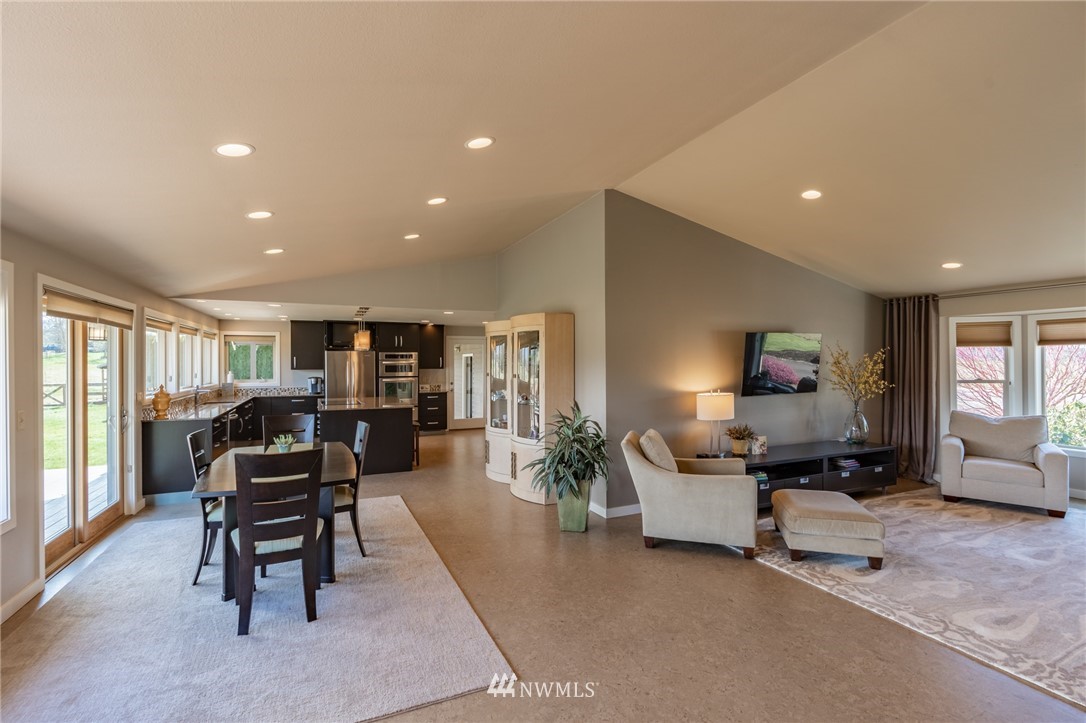 5434 Noon Road Bellingham, WA 98226 - Photo 32 of 40 a living room with furniture and a flat screen tv