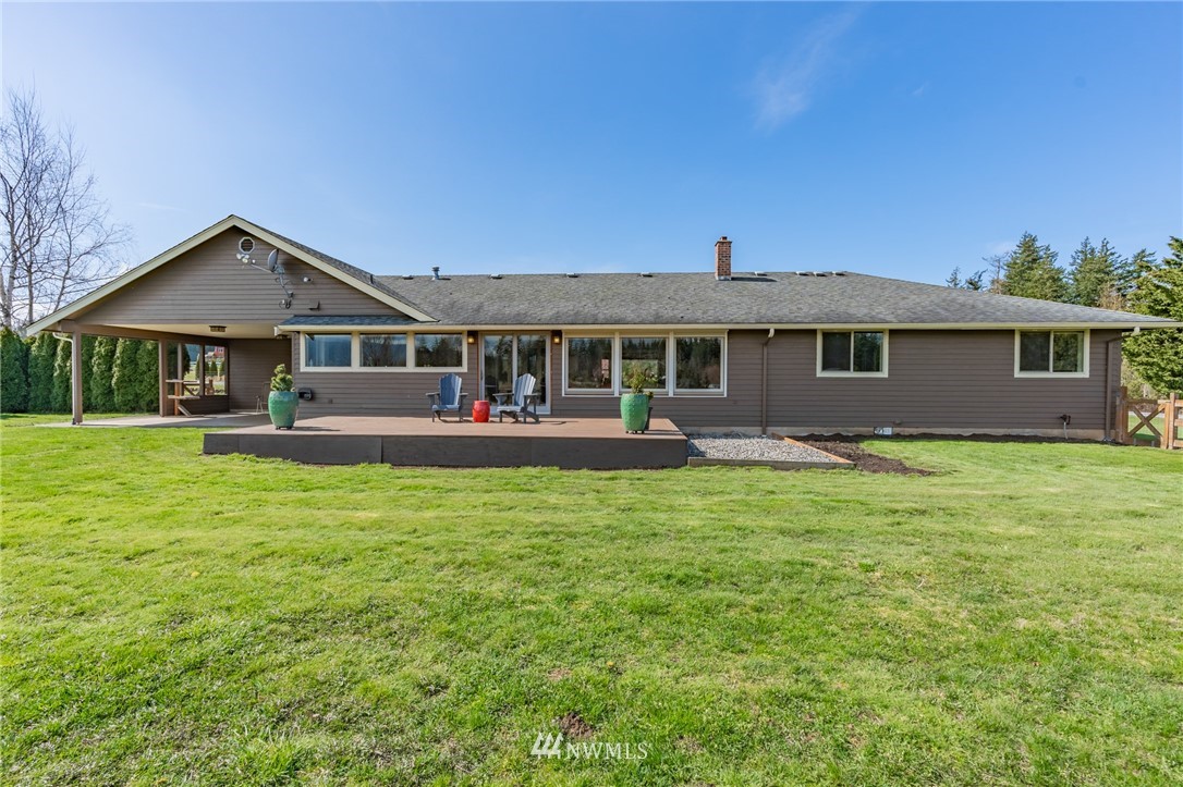 5434 Noon Road Bellingham, WA 98226 - Photo 8 of 40 a front view of a house with a garden