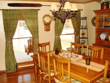 131 London Ridge Road Boones Mill, VA 24065 - Photo 12 of 37 a view of a dining room with furniture and chandelier