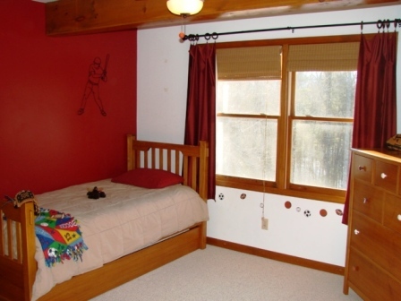 131 London Ridge Road Boones Mill, VA 24065 - Photo 14 of 37 a bedroom with a bed and a window