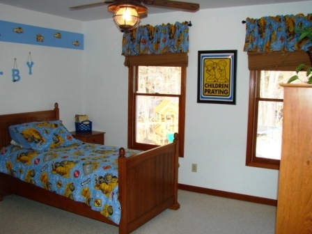 131 London Ridge Road Boones Mill, VA 24065 - Photo 16 of 37 a bedroom with a bed and window