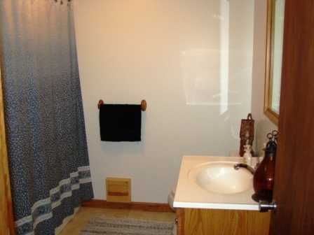 131 London Ridge Road Boones Mill, VA 24065 - Photo 25 of 37 a bathroom with a sink and a mirror