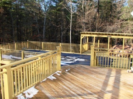 131 London Ridge Road Boones Mill, VA 24065 - Photo 33 of 37 a view of a balcony with floor to ceiling window and wooden fence
