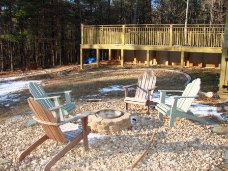 131 London Ridge Road Boones Mill, VA 24065 - Photo 34 of 37 a patio with table and chairs and potted plants