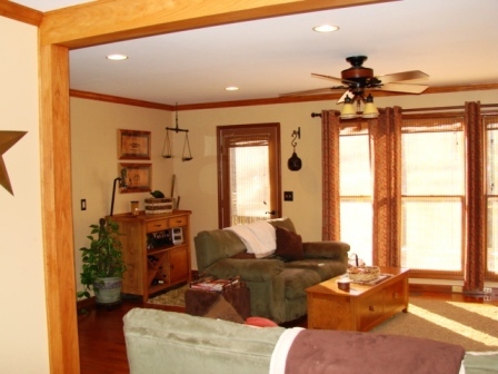 131 London Ridge Road Boones Mill, VA 24065 - Photo 5 of 37 a living room with furniture a chandelier and a window