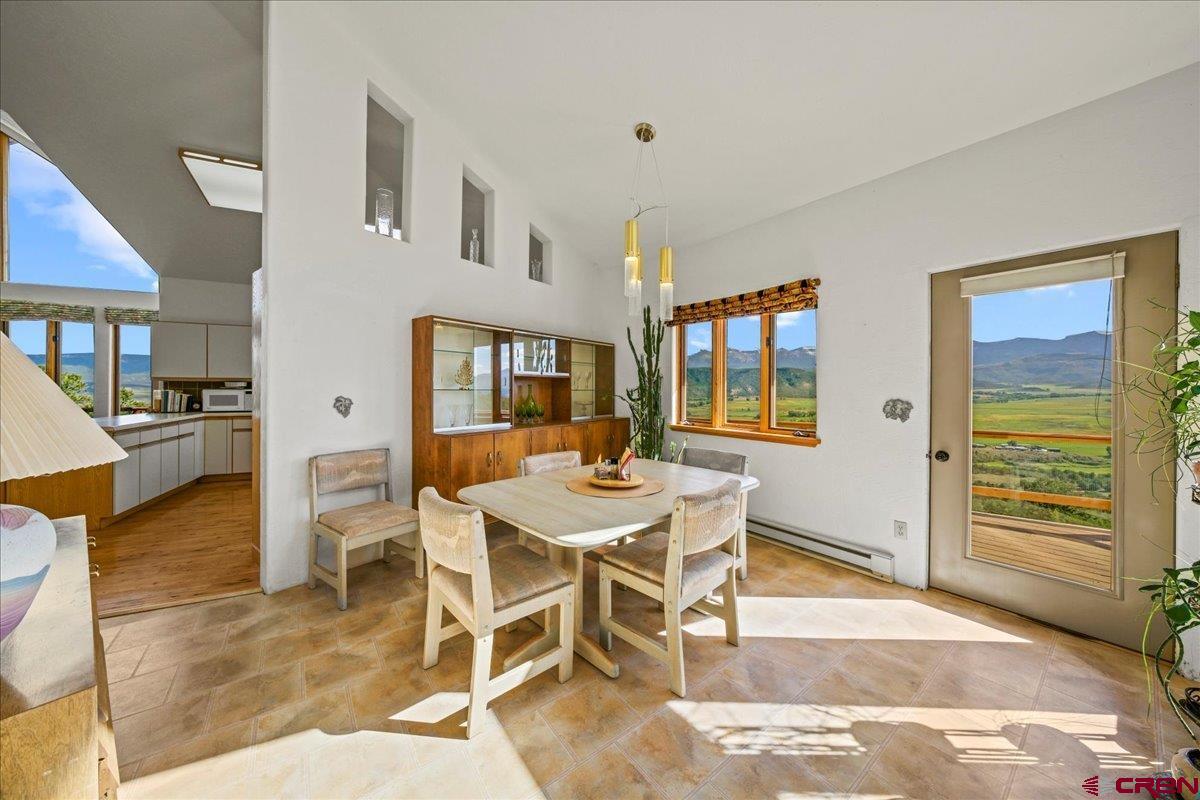 12979 County Road 1 Ridgway, CO 81432 - Photo 14 of 35 a view of a livingroom with furniture and window
