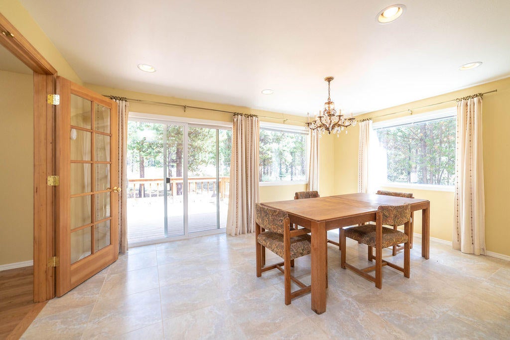 16944 Downey Road Bend, OR 97707 - Photo 13 of 44 Dining room with slider to deck, lots of light!