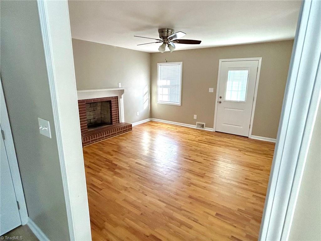 1838 Dobbins Mill Road Elkin, NC 28621 - Photo 5 of 13 Living with fireplace
