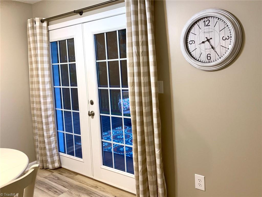 1838 Dobbins Mill Road Elkin, NC 28621 - Photo 7 of 13 Doors in dining out to deck