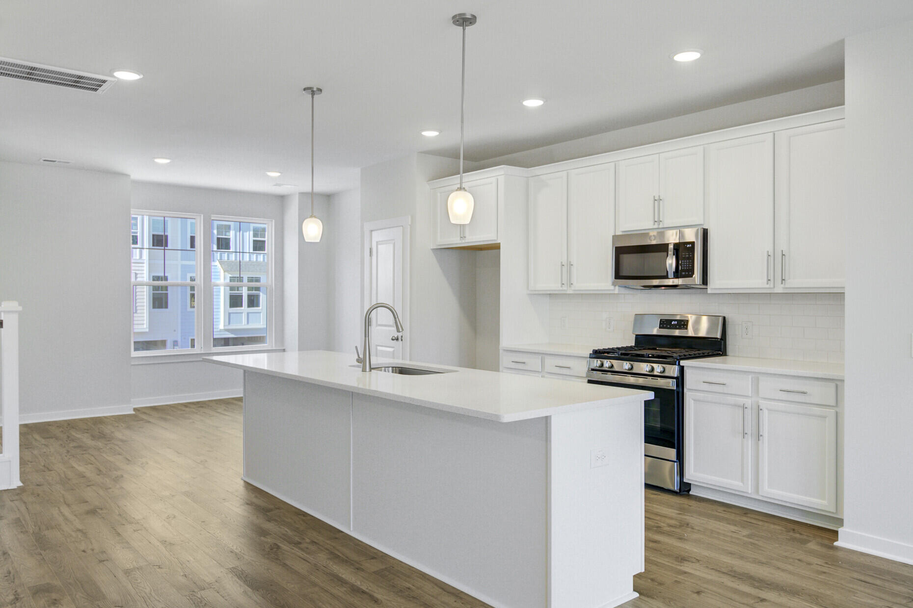 415 Caledon Court Johns Island, SC 29455 - Photo 9 of 52 Quartz counters, tile backsplash