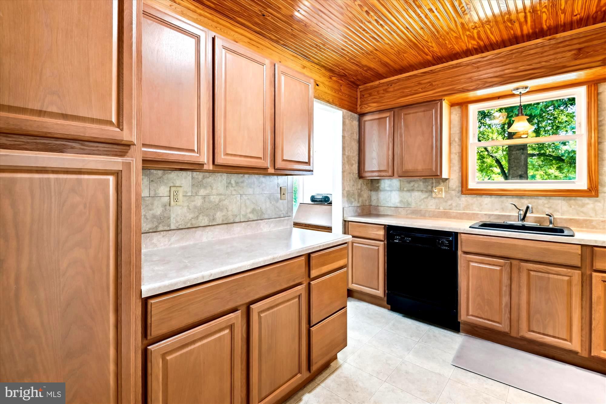 477 Rita Drive Odenton, MD 21113 - Photo 16 of 55 Adjoining Kitchen with Unique Wood Plank Ceiling