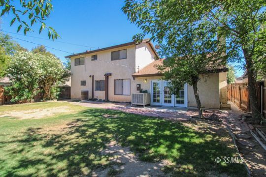 432 Debra Lane Ridgecrest, CA 93555 - Photo 36 of 39 a view of a house with backyard and sitting area