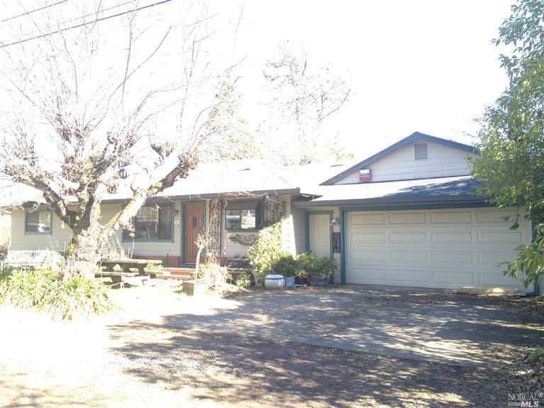 1412 Lawrence Way Santa Rosa, CA 95401 - Photo 1 of 1 a view of a house with snow on the road