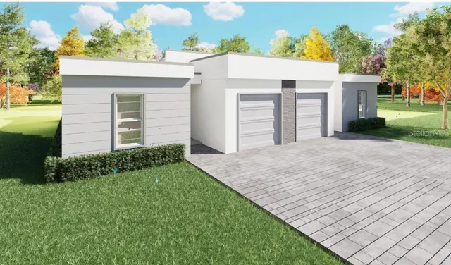 front view of a house with a yard