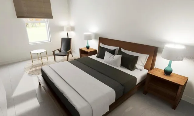 a bedroom with a bed and a window