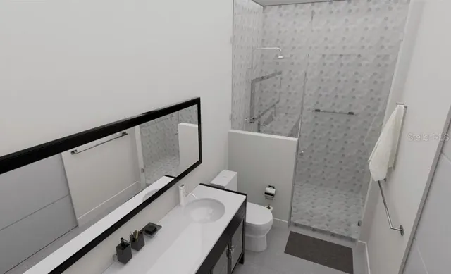 a bathroom with a sink and toilet