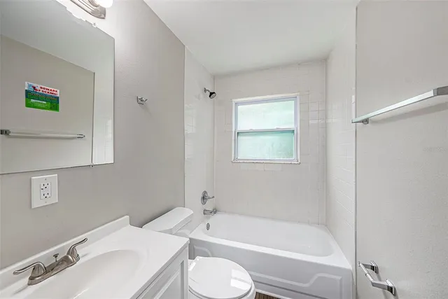 a bathroom with a sink and a bathtub