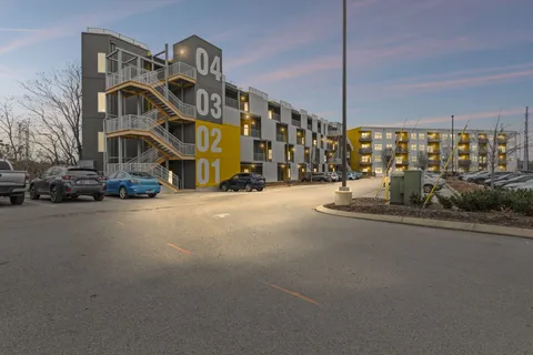 a view of a building with a street