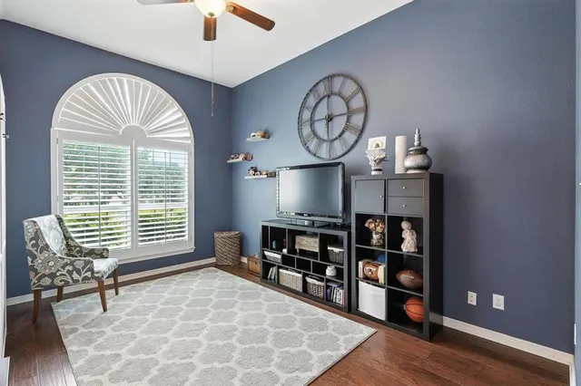 a view of a livingroom with furniture and window