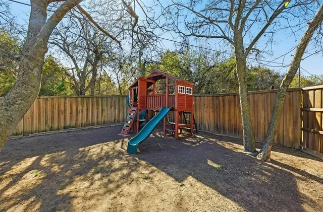a view of a park with a slide