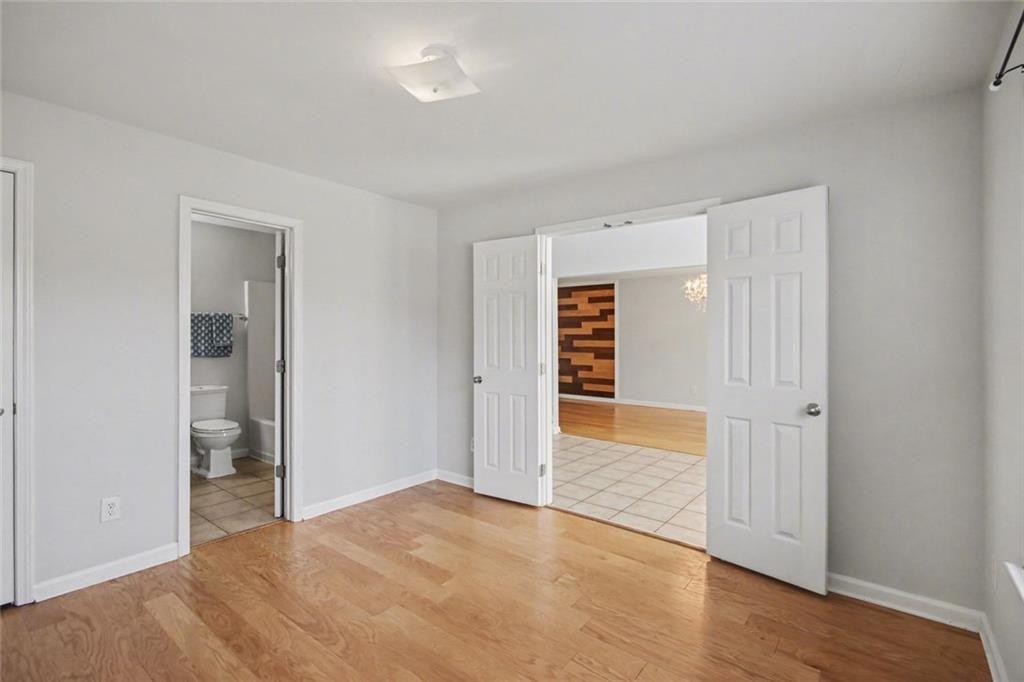 4350 Defoors Farm Trail Powder Springs, GA 30127 - Photo 18 of 35 wooden floor in an empty room