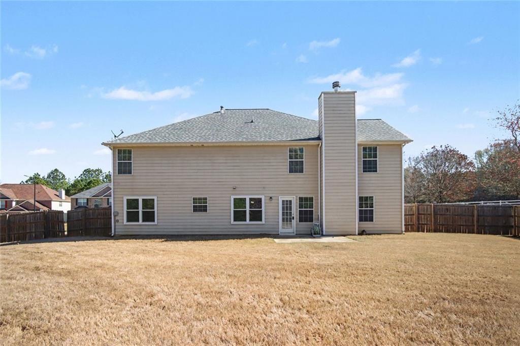 4350 Defoors Farm Trail Powder Springs, GA 30127 - Photo 32 of 35 a front view of a house with a yard