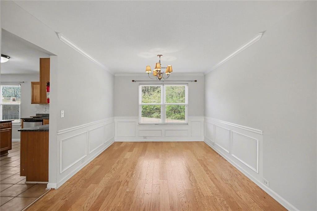 4350 Defoors Farm Trail Powder Springs, GA 30127 - Photo 6 of 35 wooden floor in an empty room with a window