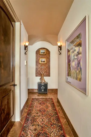 a spacious bedroom with two beds and a dresser
