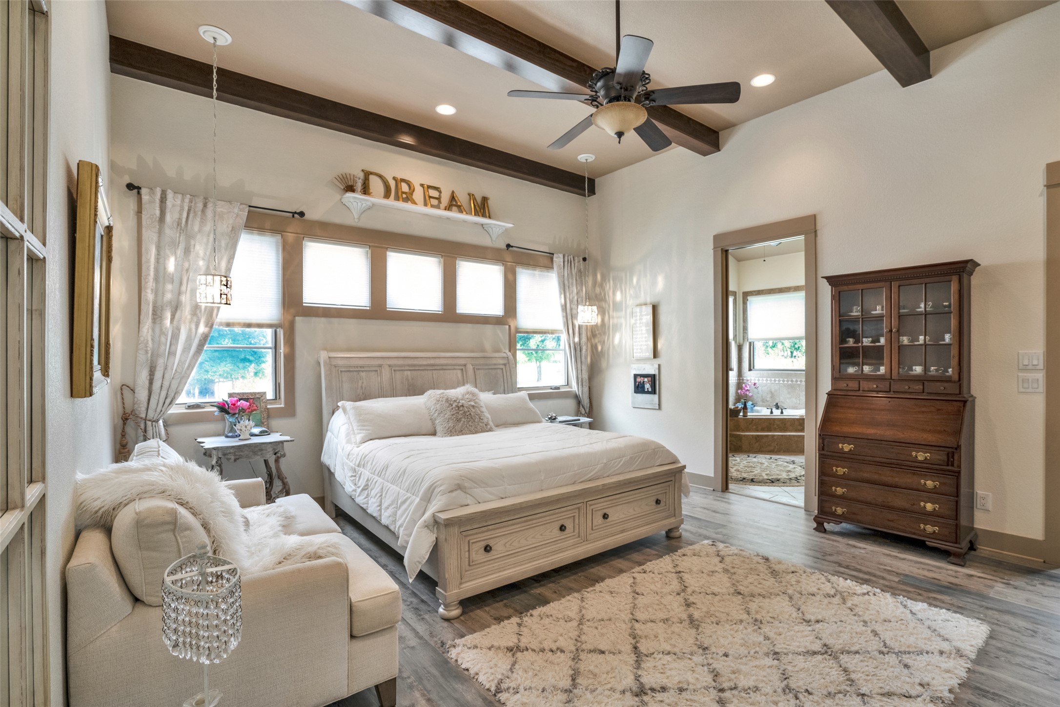 601 Strada Luca Florence, TX 76527 - Photo 20 of 40 a spacious bedroom with two beds and a dresser