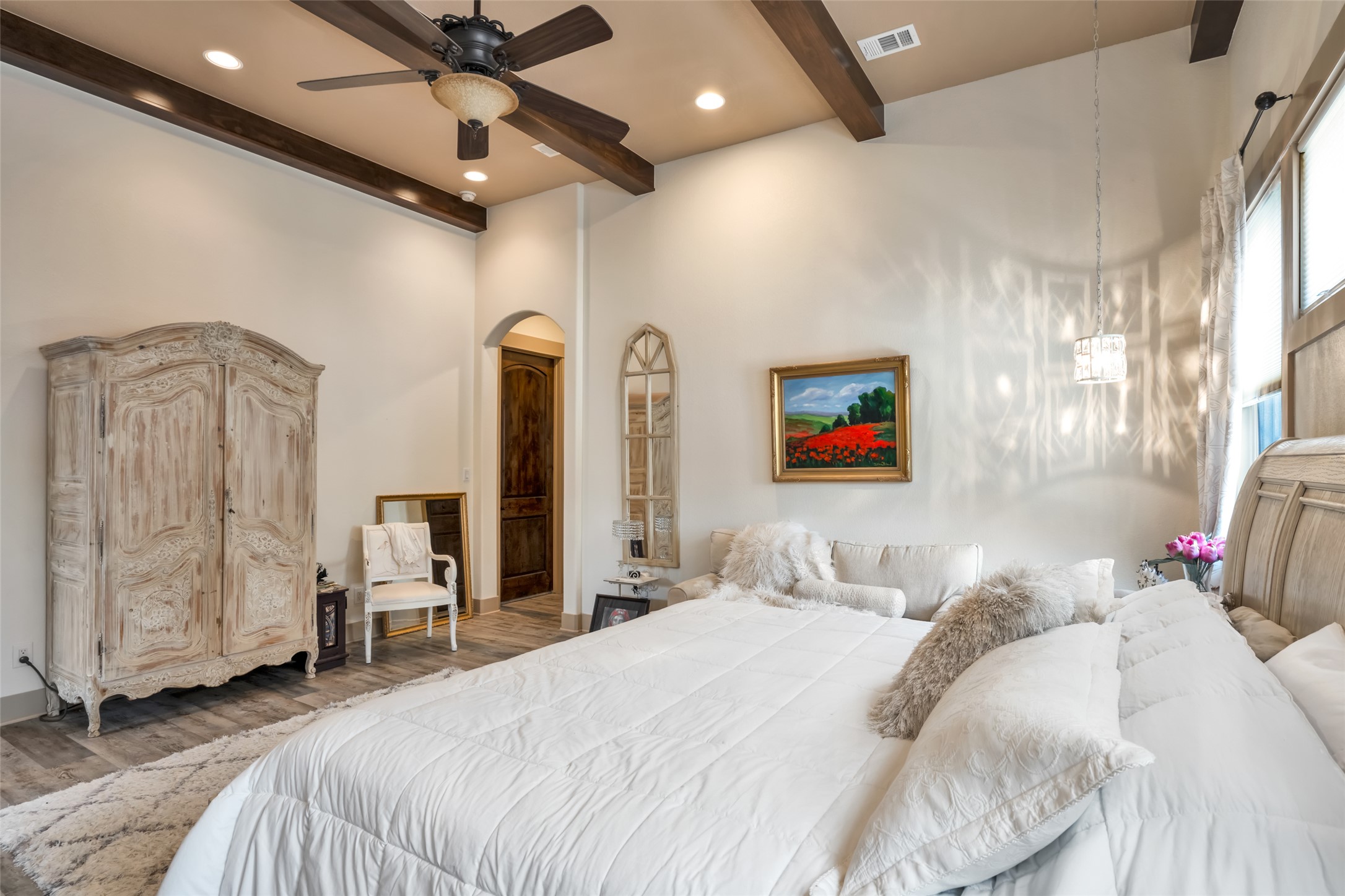 601 Strada Luca Florence, TX 76527 - Photo 22 of 40 a bedroom with a bed and a large mirror