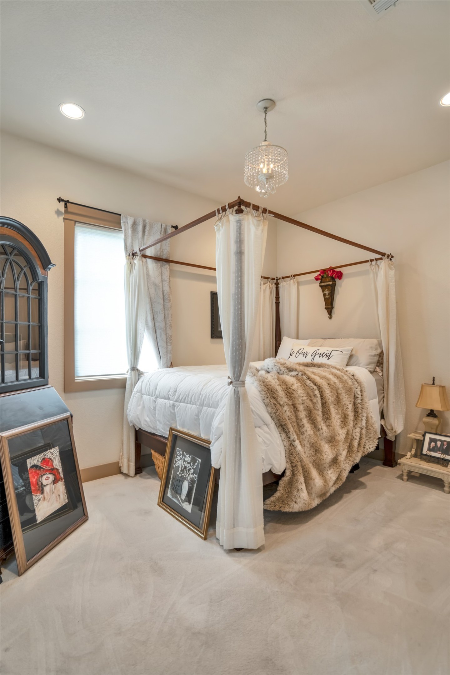 601 Strada Luca Florence, TX 76527 - Photo 23 of 40 a bedroom with a bed and a tv