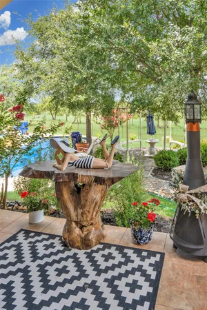a view of a fountain with a fountain in a yard