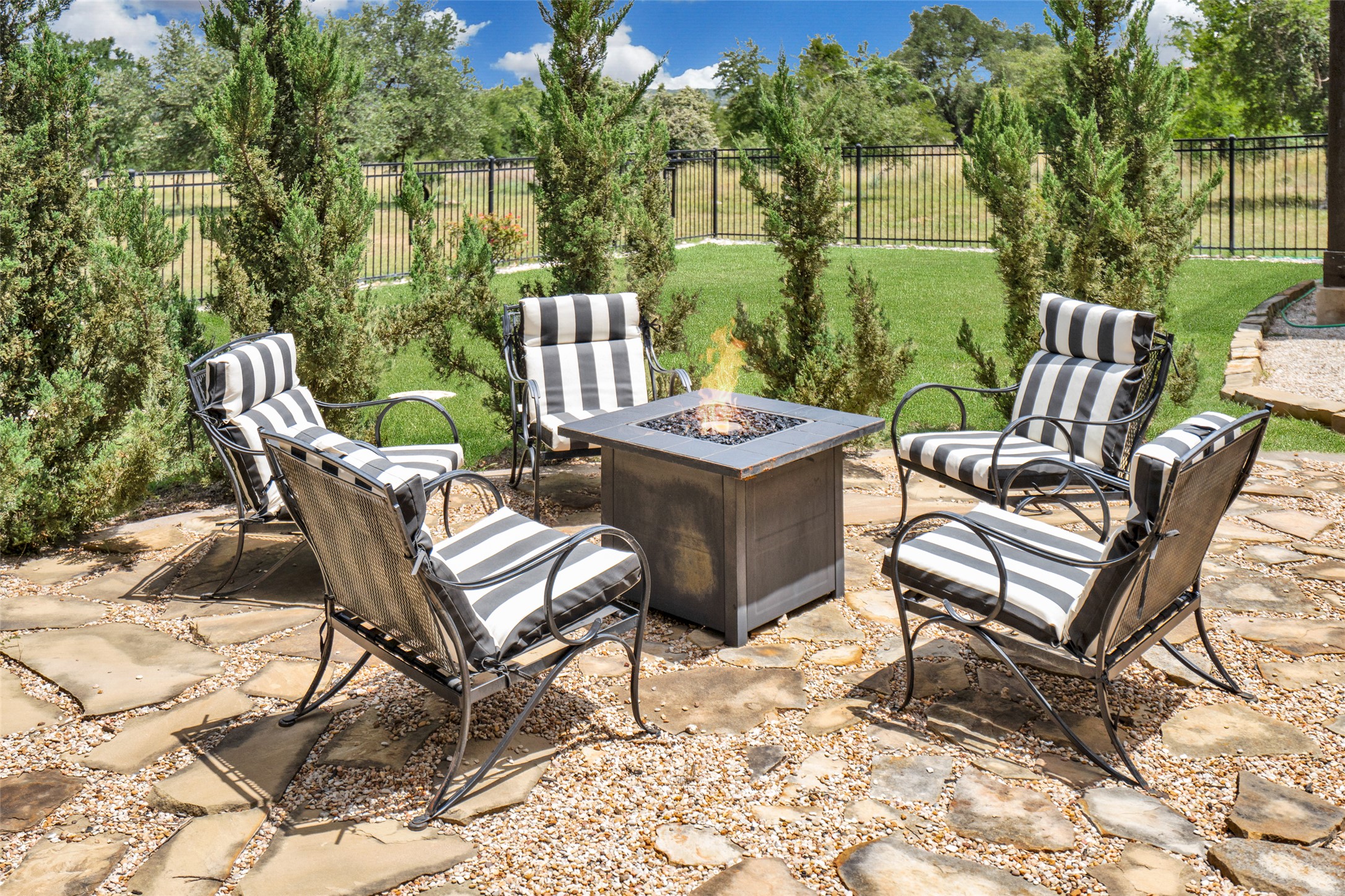 601 Strada Luca Florence, TX 76527 - Photo 34 of 40 a view of a chairs and table in backyard