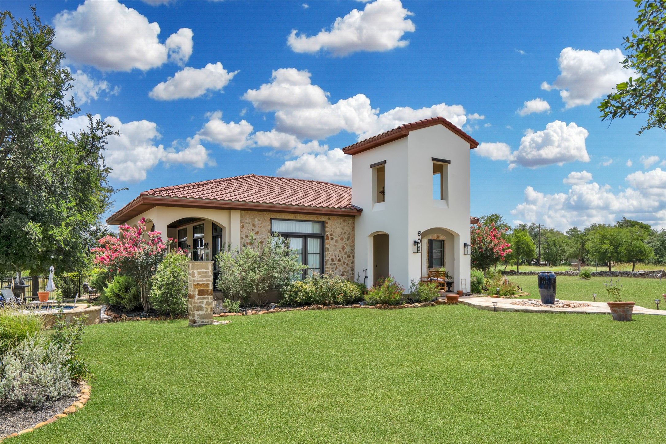 601 Strada Luca Florence, TX 76527 - Photo 7 of 40 a front view of a house with garden