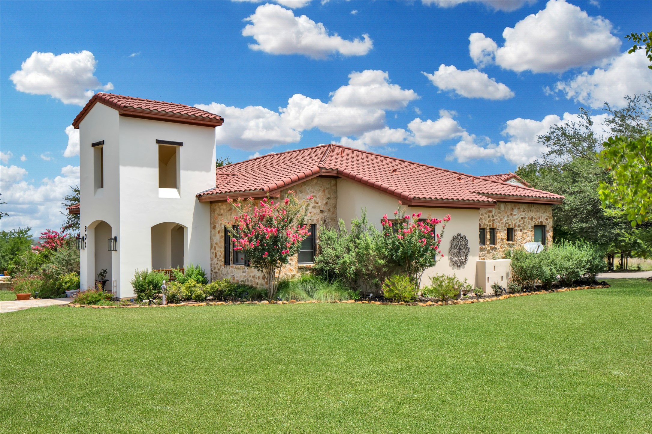 601 Strada Luca Florence, TX 76527 - Photo 9 of 40 a front view of a house with garden