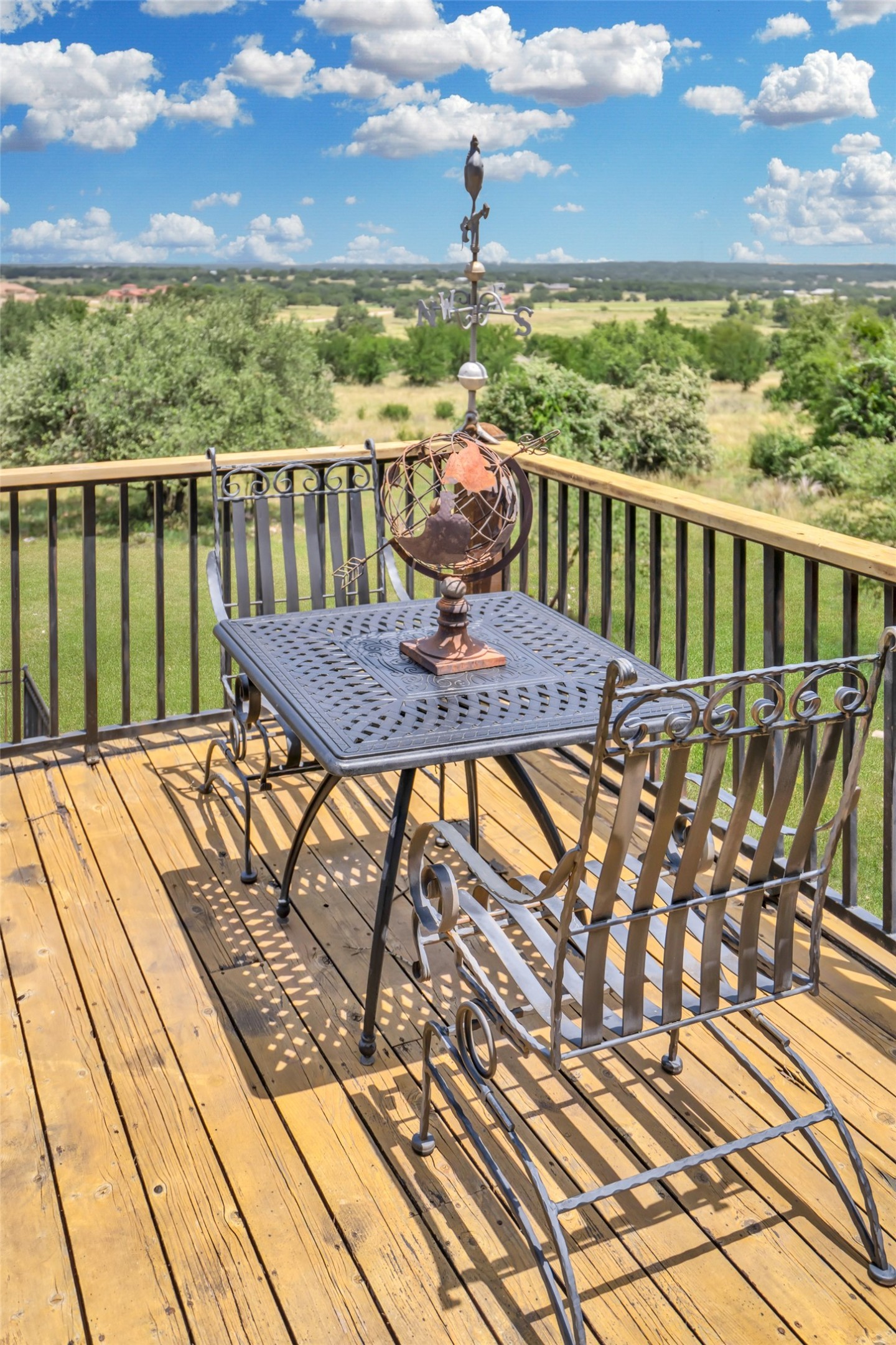 601 Strada Luca Florence, TX 76527 - Photo 10 of 40 a view of a balcony with lake view and wooden floor