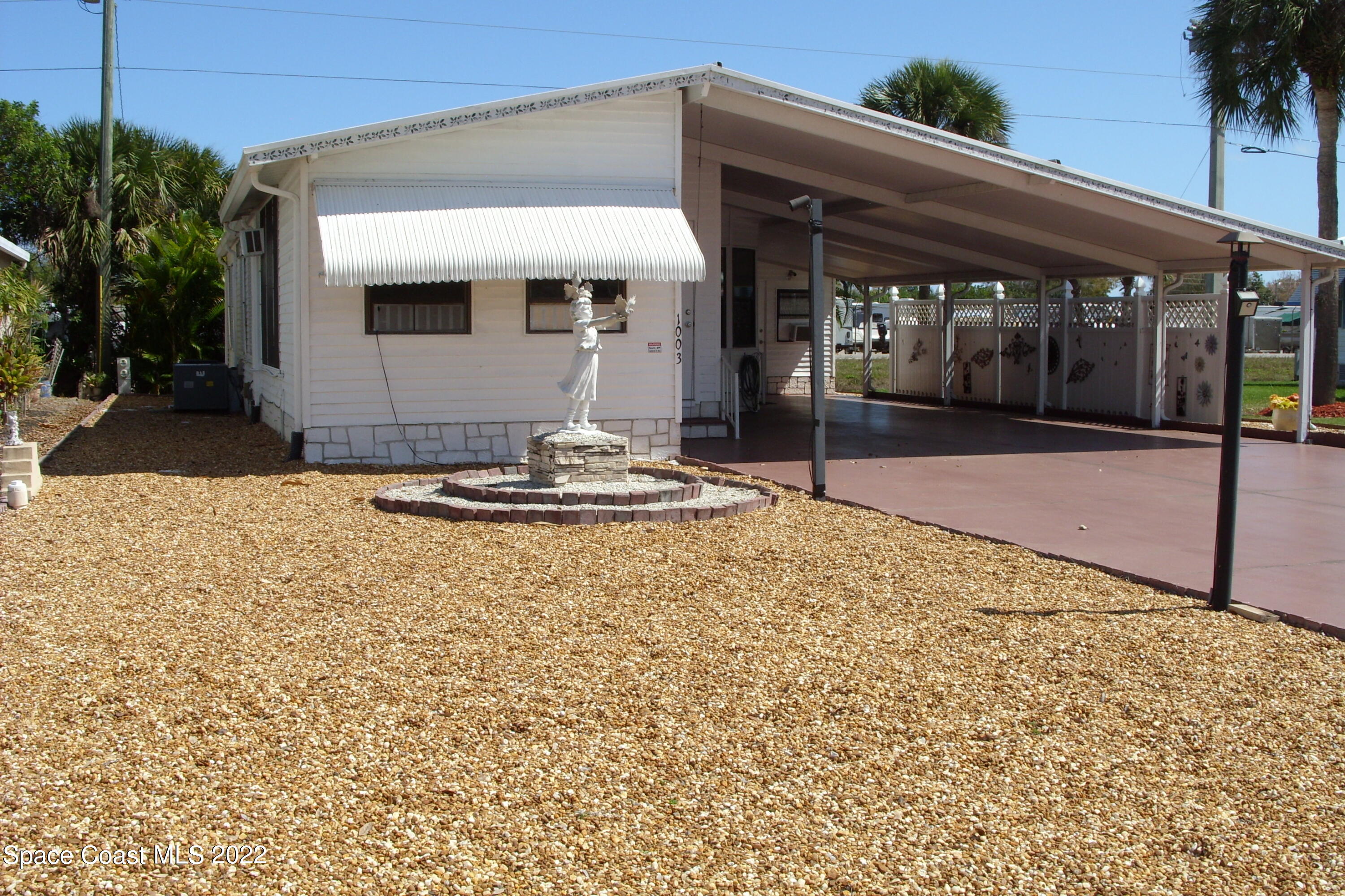 1003 Sebastian Road Barefoot Bay, FL 32976 - Photo 1 of 66 SN852710