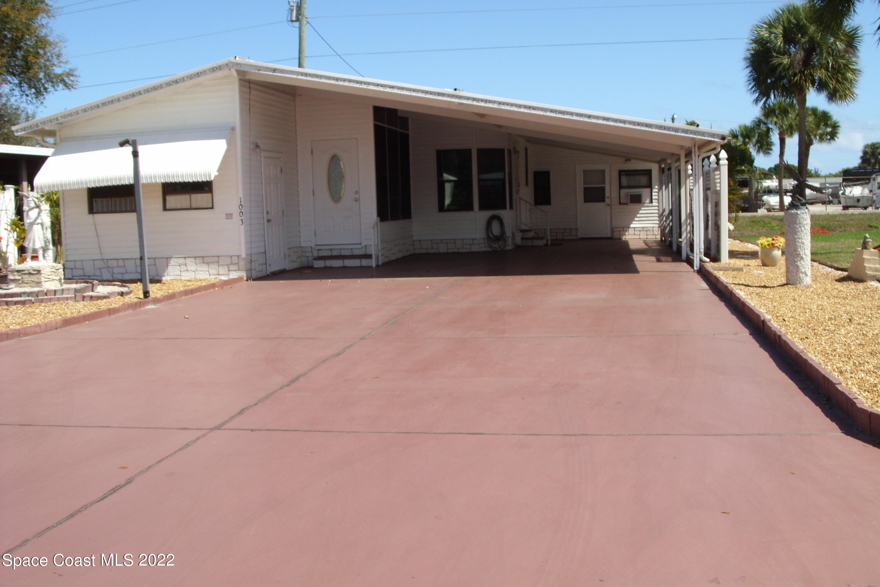 1003 Sebastian Road Barefoot Bay, FL 32976 - Photo 3 of 66 SN852712