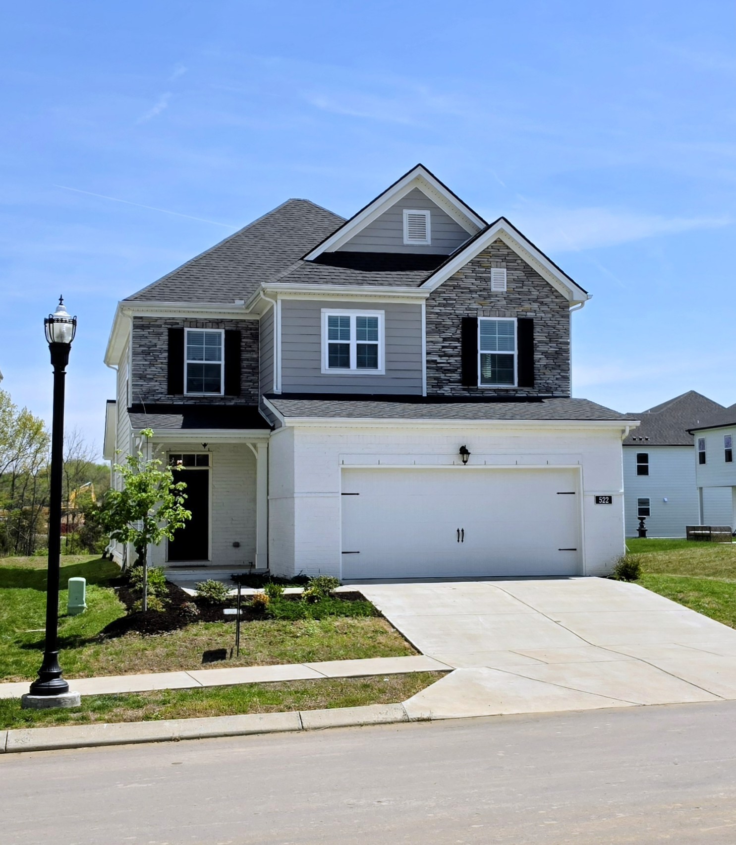 522 Red Barn Way Mount Juliet, TN 37122 - Photo 1 of 25 a front view of a house with a yard and garage