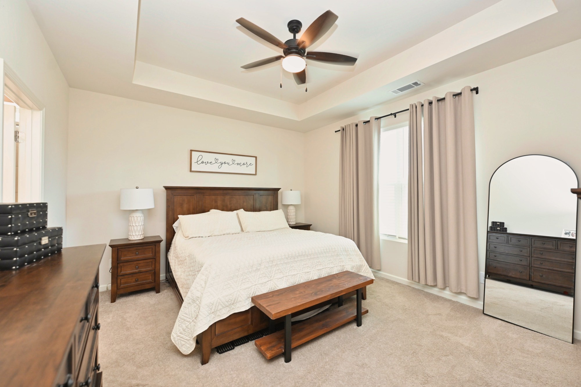 522 Red Barn Way Mount Juliet, TN 37122 - Photo 11 of 25 a bedroom with a bed and a chandelier