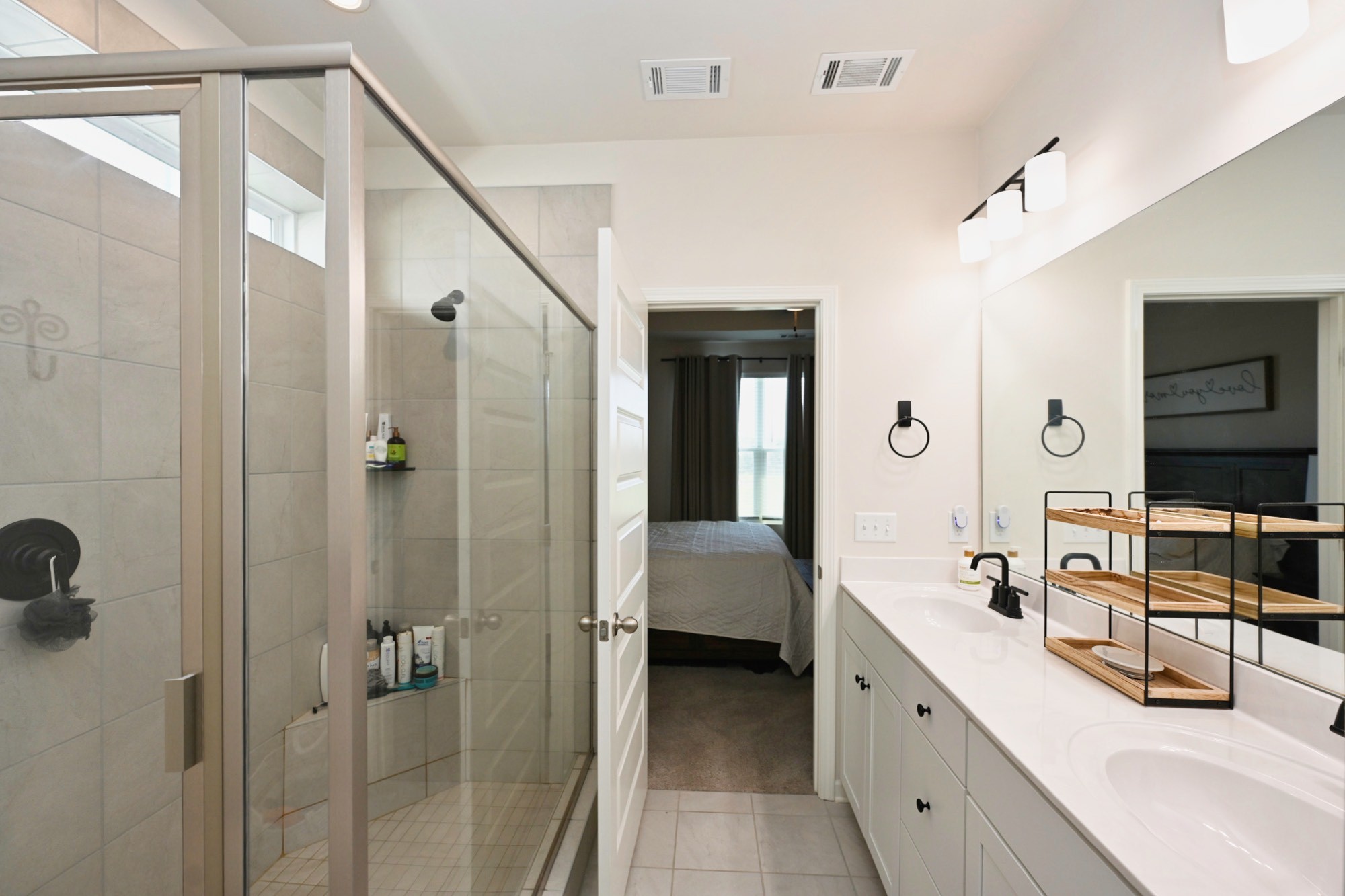 522 Red Barn Way Mount Juliet, TN 37122 - Photo 12 of 25 a bathroom with a double vanity sink a mirror and shower
